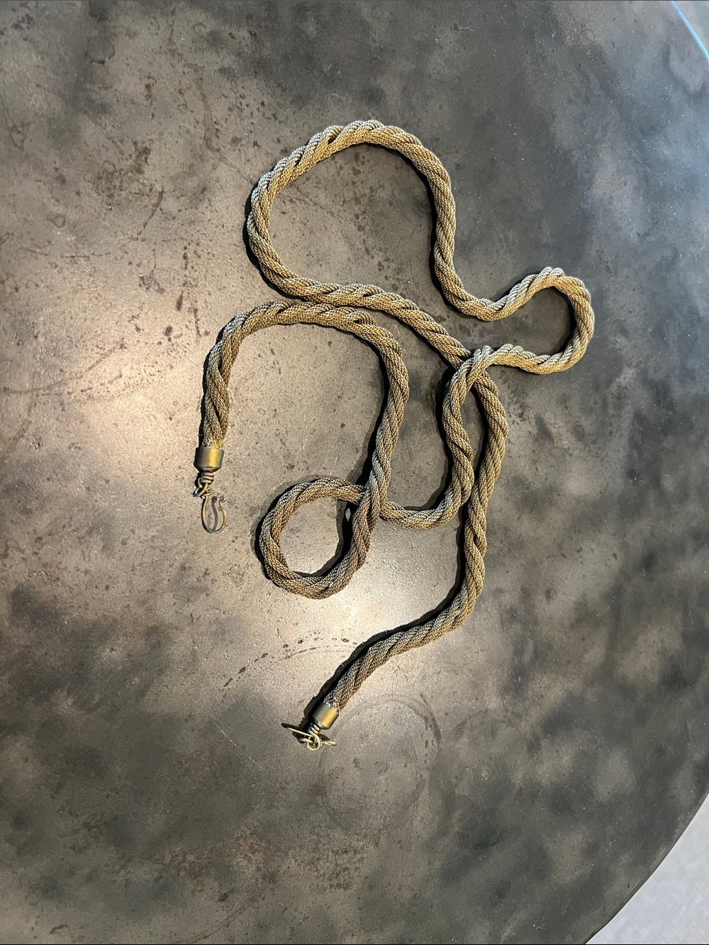 Sarah Cavender metalworks twisted brass necklace.  Approx 36 “ long.